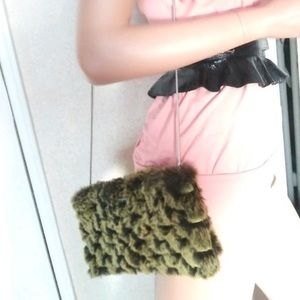 Byblos trimmed rabbit fur green/brown mini bag with silver chain strap. Italy